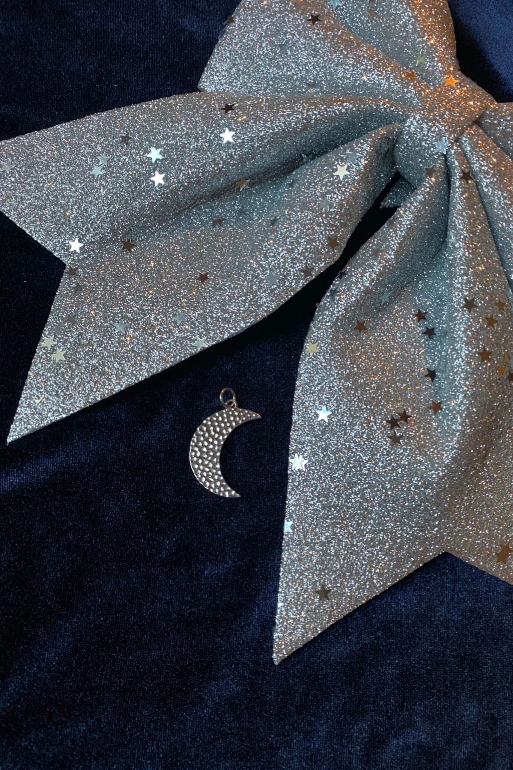 photo of glitter bow and our moon pendant